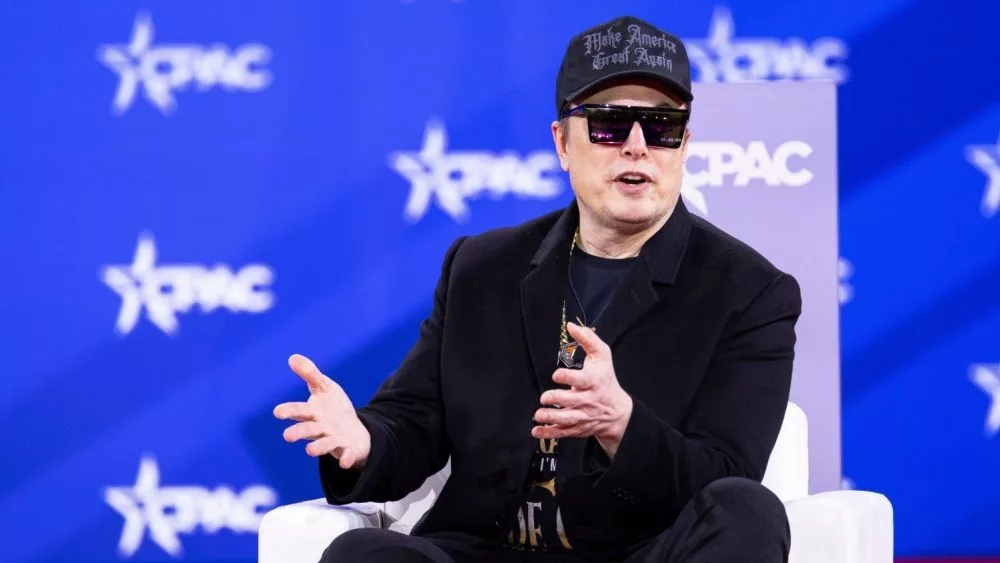 Elon Musk speaks with Newsmax Host Rob Schmitt on day 1 of the 2025 Conservative Political Action Conference. NATIONAL HARBOR^ MD^ USA — February 20 2025