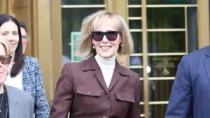 E. Jean Carroll smiles as she leaves the courtroom after a jury found former President Trump liable for sexual abuse and defamation. New York^ NY USA - May 9 2023