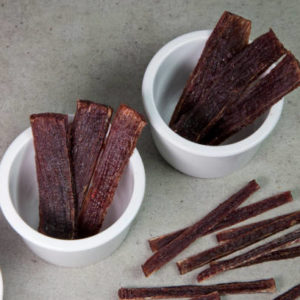 homemade-jerked-beef-in-crockery-cups-with-sliced-beef-jerky