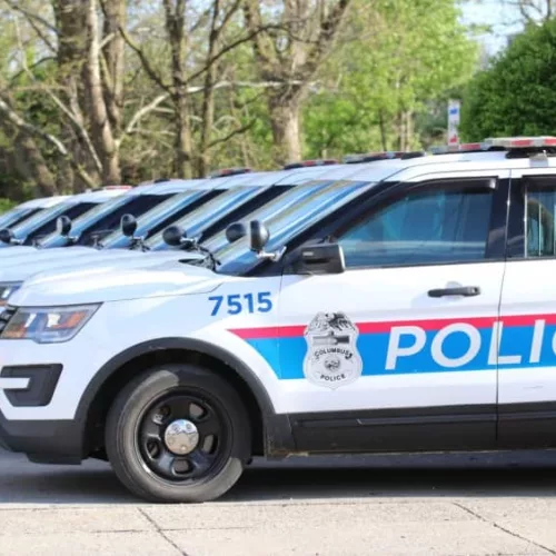 Columbus Ohio May 1^ 2022 A succession of police cars lined up in front of precinct.