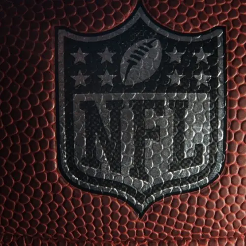 Closeup of an NFL logo on an American football