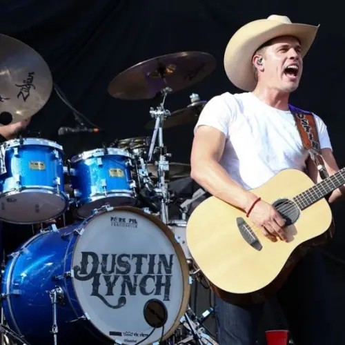 Dustin Lynch performs during the 'Kick The Dust Up' Tour at Vanderbilt Stadium on July 11^ 2015 in Nashville^ Tennessee.