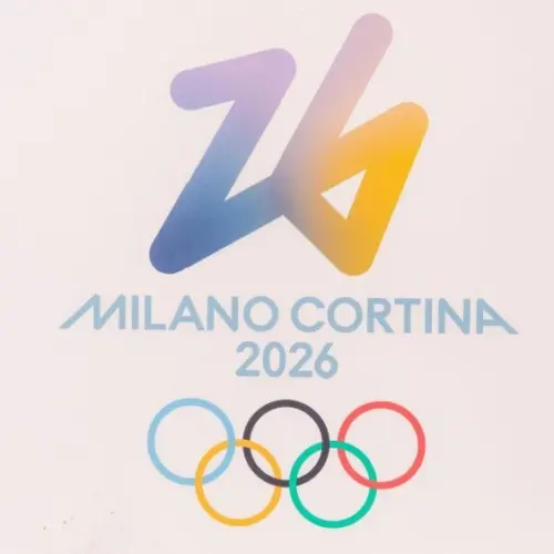 Milano Cortina 2026 Olympic Games logo with the number 26 and colorful Olympic rings displayed prominently on a white background Cortina^ Italy - January 27^ 2026