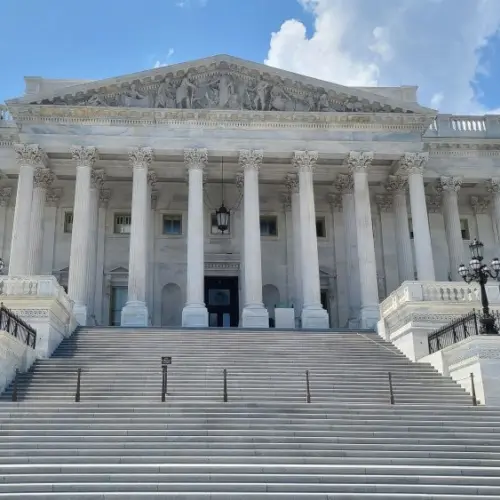 The Eastern facade with the stair to the House of Representatives of the United States Capitol Building^ on Capitol Hill in Washington DC^ USA.