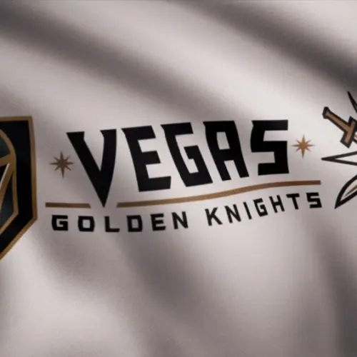 Waving flag with Vegas Golden Knights NHL hockey team logo. Close-up of waving flag with Vegas Golden Knights NHL hockey team logo^ seamless loop. Editorial footage