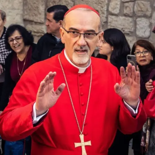 Cardinal Pierbattista Pizzaballa^ Latin Patriarch of Jerusalem^ greets the crowd as he leaves the Church of the Nativity after the Christmas celebrations. Bethlehem^ West Bank^ December 25^ 2025