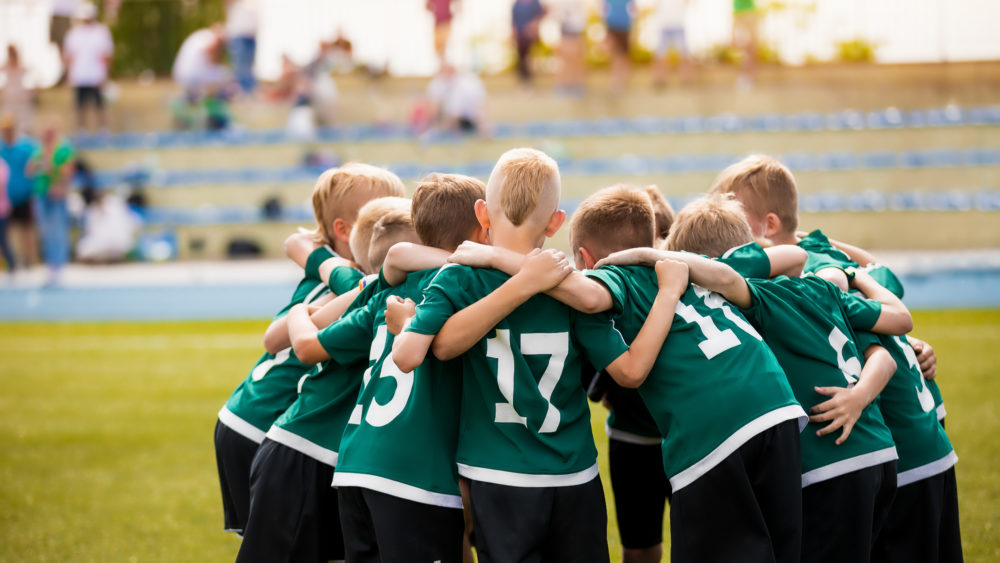 youngfootballsoccerplayersinsportswear-youngsportsteamwith
