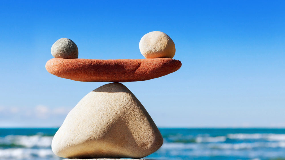 conceptofharmonyandbalance-balancestonesagainstthesea
