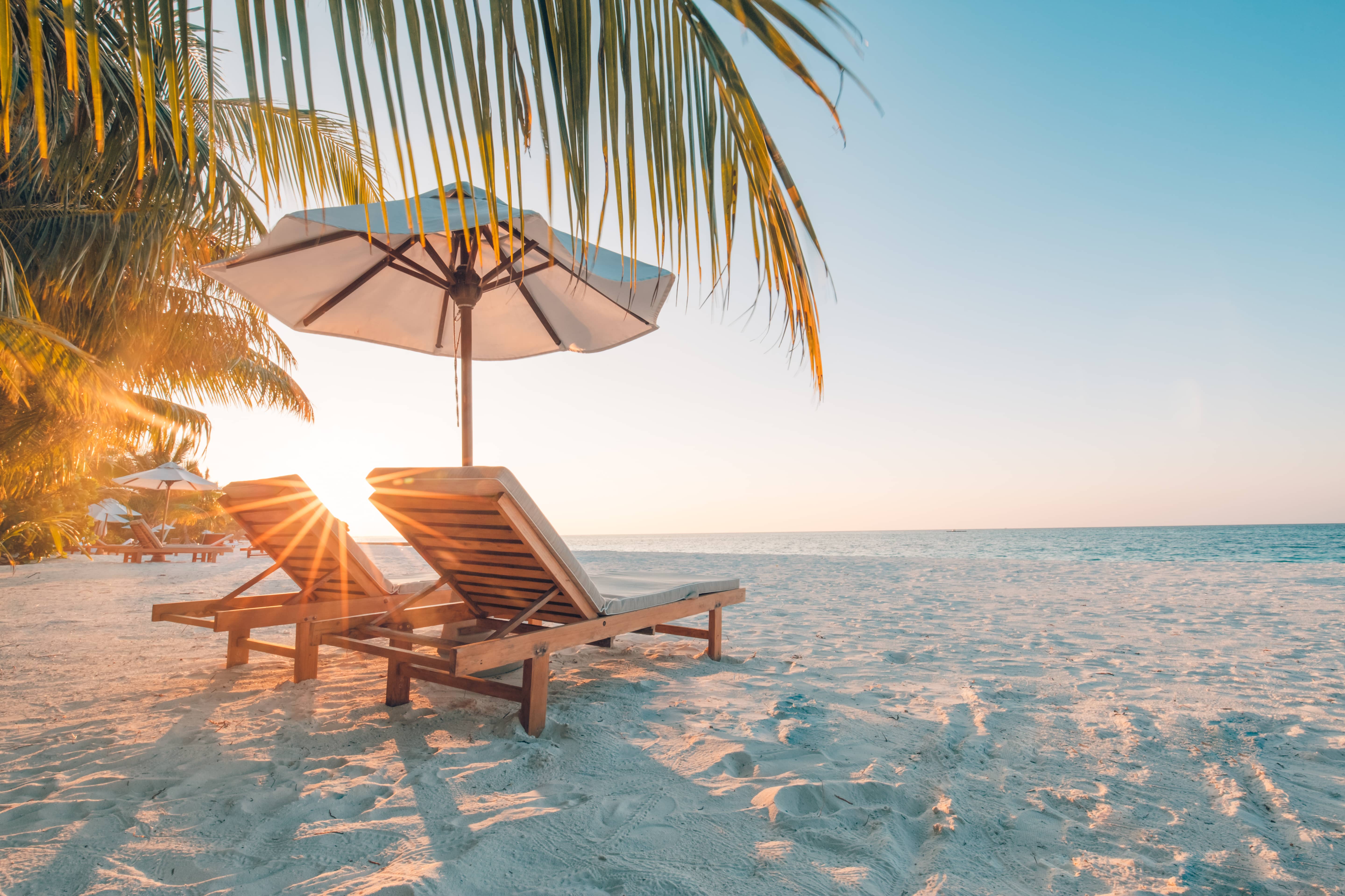 beautifulbeach-chairsonthesandybeachnearthesea