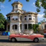Havana classic car and building. Photo by Sally Harris.
