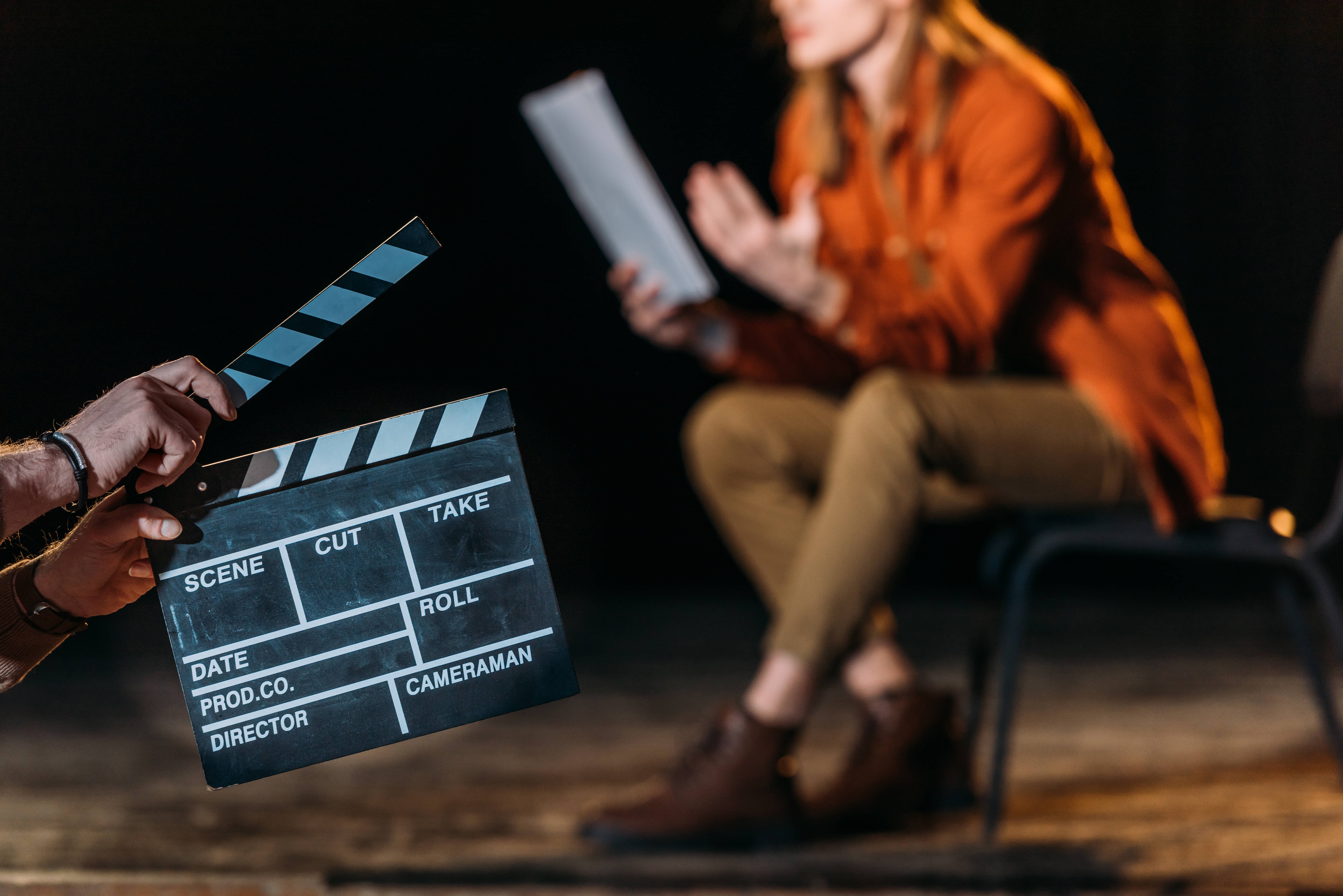 selectivefocusofactorwithclapboardinfront