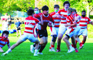 The Greenwich High School rugby team takes to the field against rvial Fairfield Prep earlier this season. In the contest, it was Big Red that came away with the 39-10 victory.