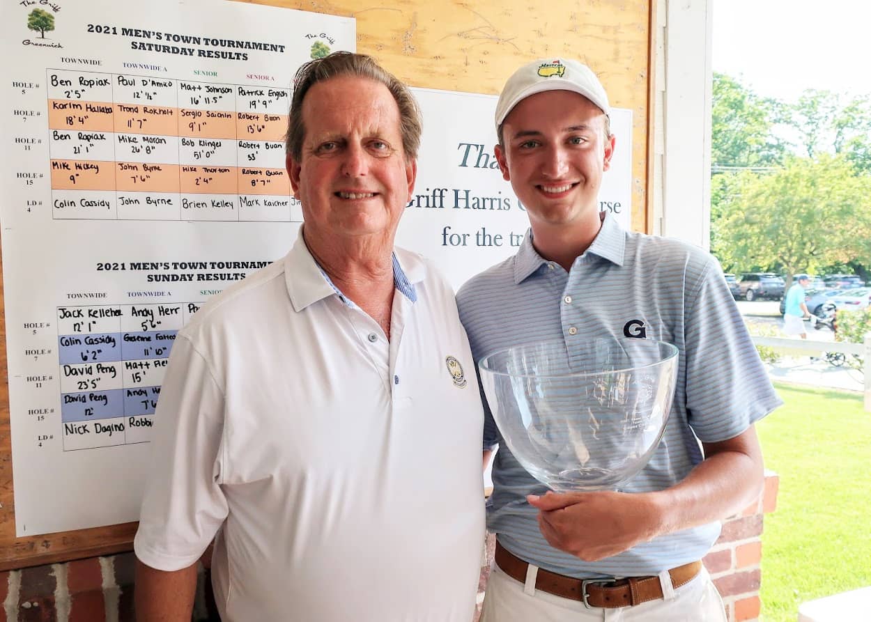 Former Greenwich High School standout and current Georgetown University student Ben Ropiak is all smiles after claiming the 76th annual Greenwich Townwide Men's Golf championship. Standing next to Ropiak is Joe Felder, longtime organizer of the event, who is retirning.