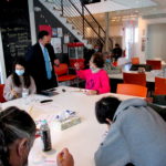 Morning time at the Success Club where recreation and fellowship takes place, with Peter Tesei doing a meet and greet. Photo by Anne W. Semmes