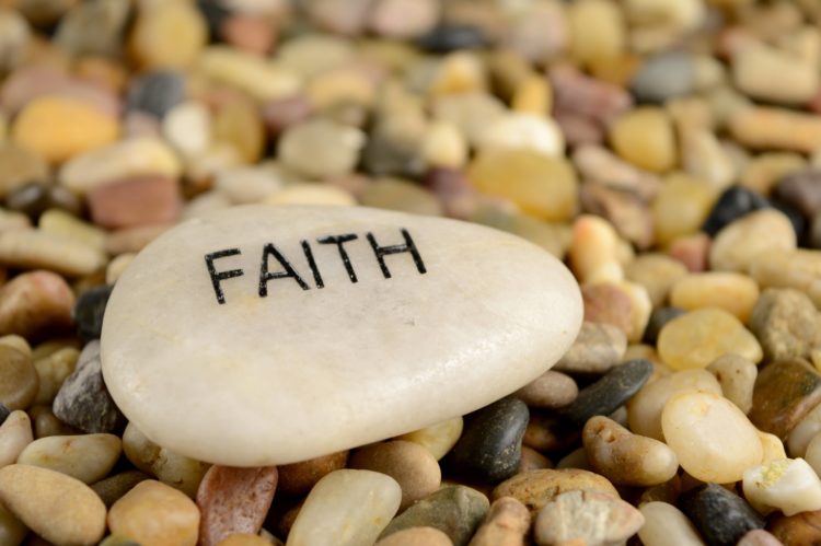 asmoothriverstoneisetchedwiththewordfaith