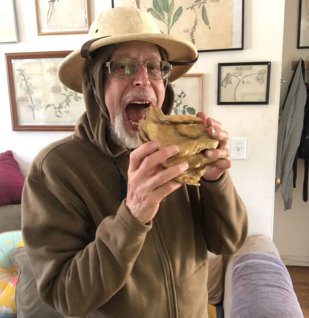 wildman-with-chicken-mushroom-sculpture
