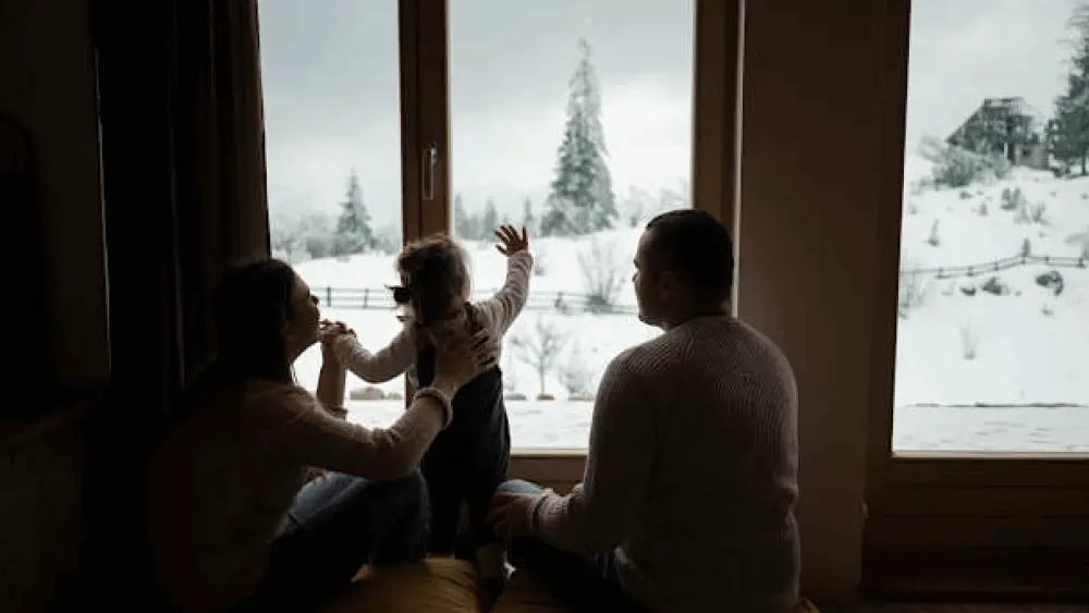 snow-day-family-looking-out-the-window
