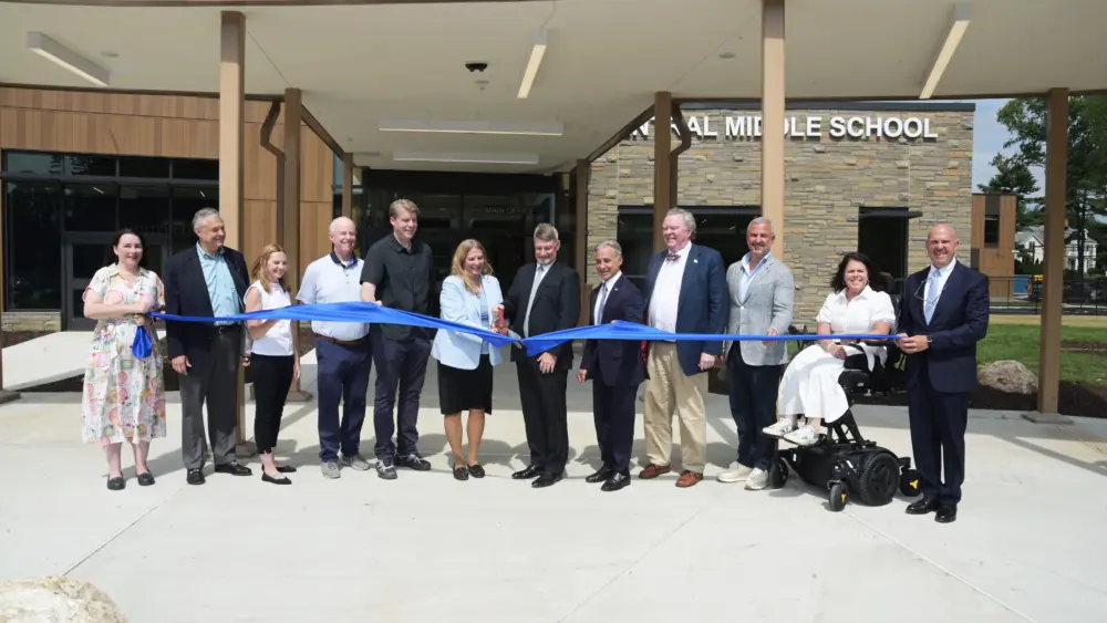Central Middle School Building Committee members, Greenwich Public Schools administrators and town officials cut the ribbon at the new Central Middle School during its grand-opening ceremony Monday, Aug. 24, 2026.