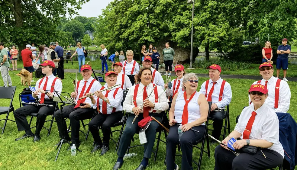 Members of the Sound Beach Community Band gather during a Memorial Day event in Old Greenwich, wearing uniforms reflecting the group’s longstanding connection with the Sound Beach Volunteer Fire Department. Photo courtesy of The Sound Beach Community Band