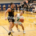 KellySteed-134: The (#2 Seed) Mansfield Lions took on the (#1 Seed) Thayer Bobcats in the Championship Game of the 22nd Cabool Holiday Tournament at Cabool High School on Thursday, Dec 29, 2022