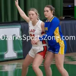 kellysteed_hsgbdoravsava-77: The Dora Lady Falcons battle the Ava Lady Bears in the 5th place contest of the 51st Thayer Winter Classic, held on Saturday, January 25, 2025, at Thayer High School in Thayer, MO.