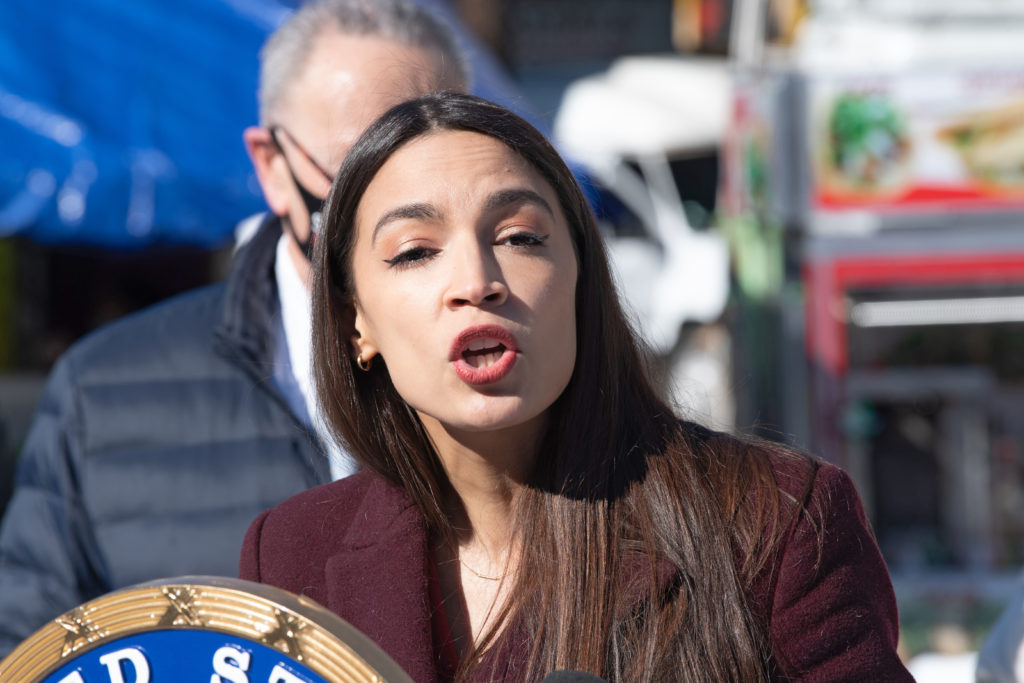 senate-majority-leader-chuck-schumer-and-alexandria-ocasio-cortez-team-to-help-families-of-covid-19-victims-in-new-york-us-08-feb-2021