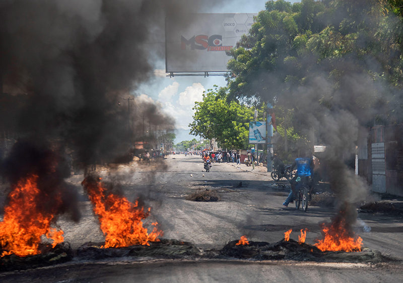 port-au-prince-haiti-17th-sep-2019-protesters-set-on-fire-a-barricade-during-protests-at-a-street-in-port-au-prince-haiti-17-september-2019-the-capital-and-several-provincial-cities-of-haiti-liv