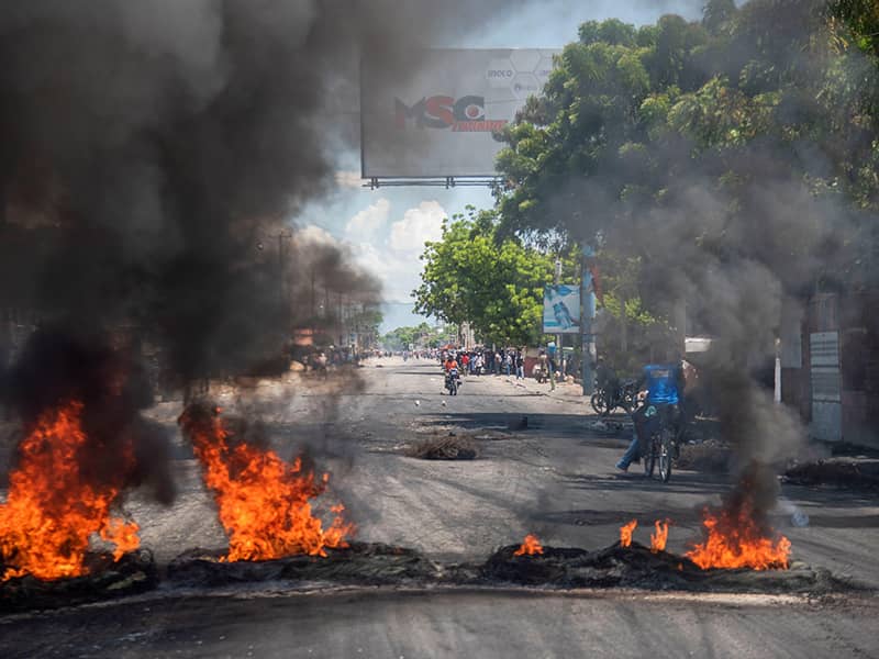 port-au-prince-haiti-17th-sep-2019-protesters-set-on-fire-a-barricade-during-protests-at-a-street-in-port-au-prince-haiti-17-september-2019-the-capital-and-several-provincial-cities-of-haiti-liv