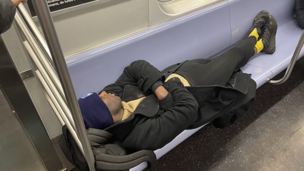 Homeless sleeping the subways again