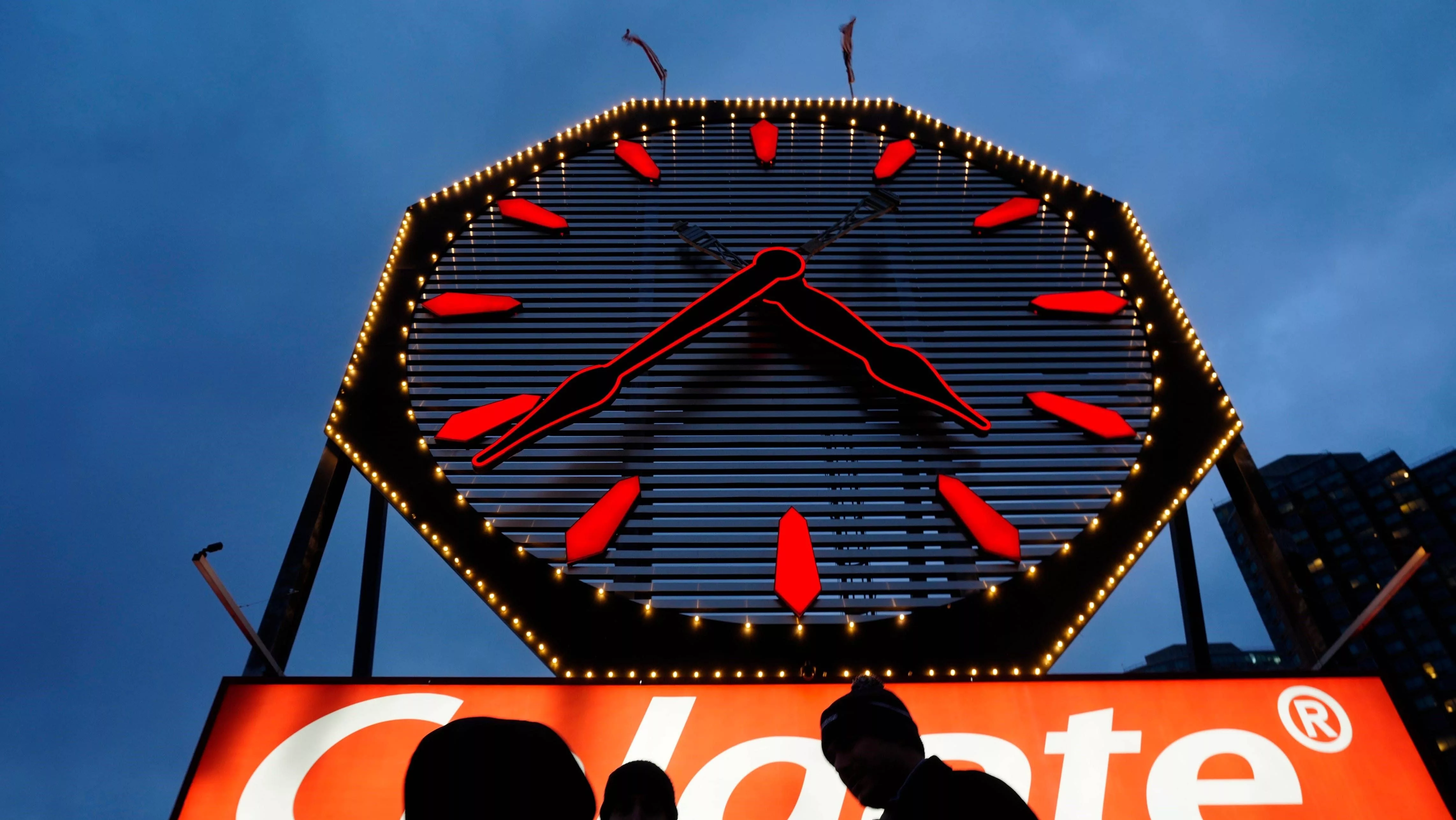 people-are-silhouetted-in-front-of-the-colgate-clock-monday-december-3-2024