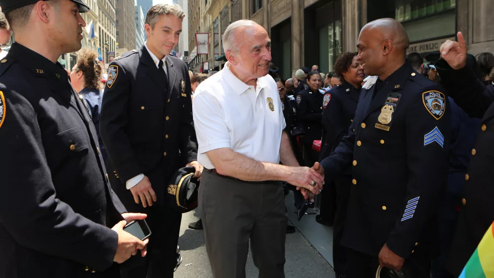 New York, NY, USA; New York City police commissioner Bill Bratton greets his troops during the New York City pride march parade.