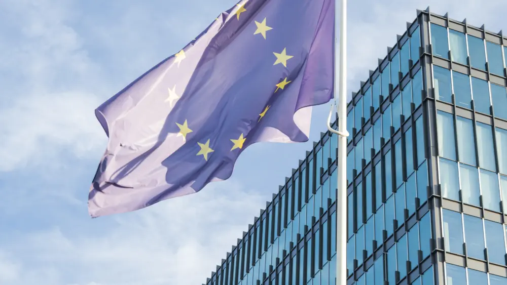 eu-flag-blue-on-the-background-of-the-building