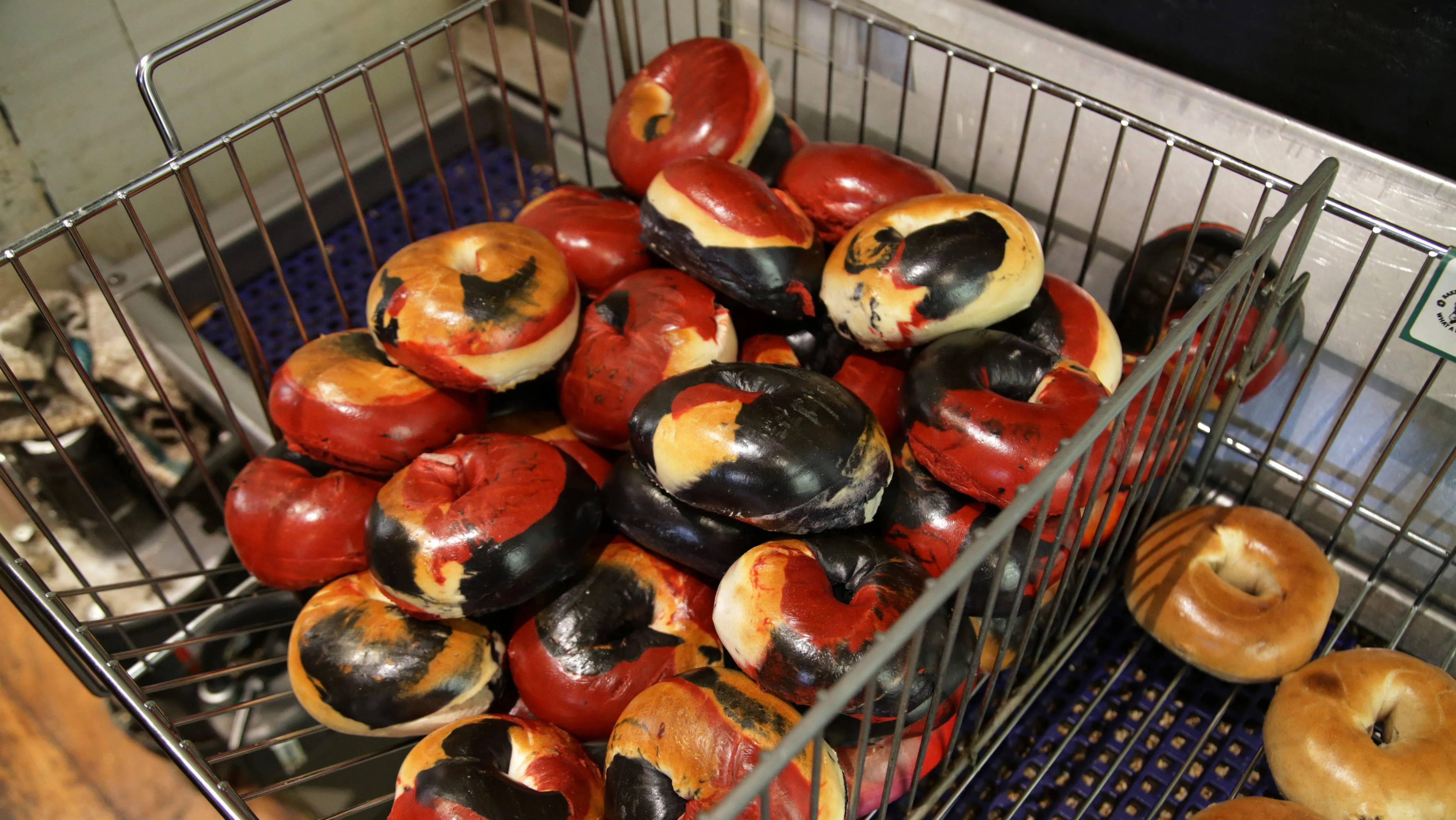 bagels-in-the-colours-of-the-toronto-raptors-lie-in-a-basket-at-what-a-bagel-bakery-in-toronto
