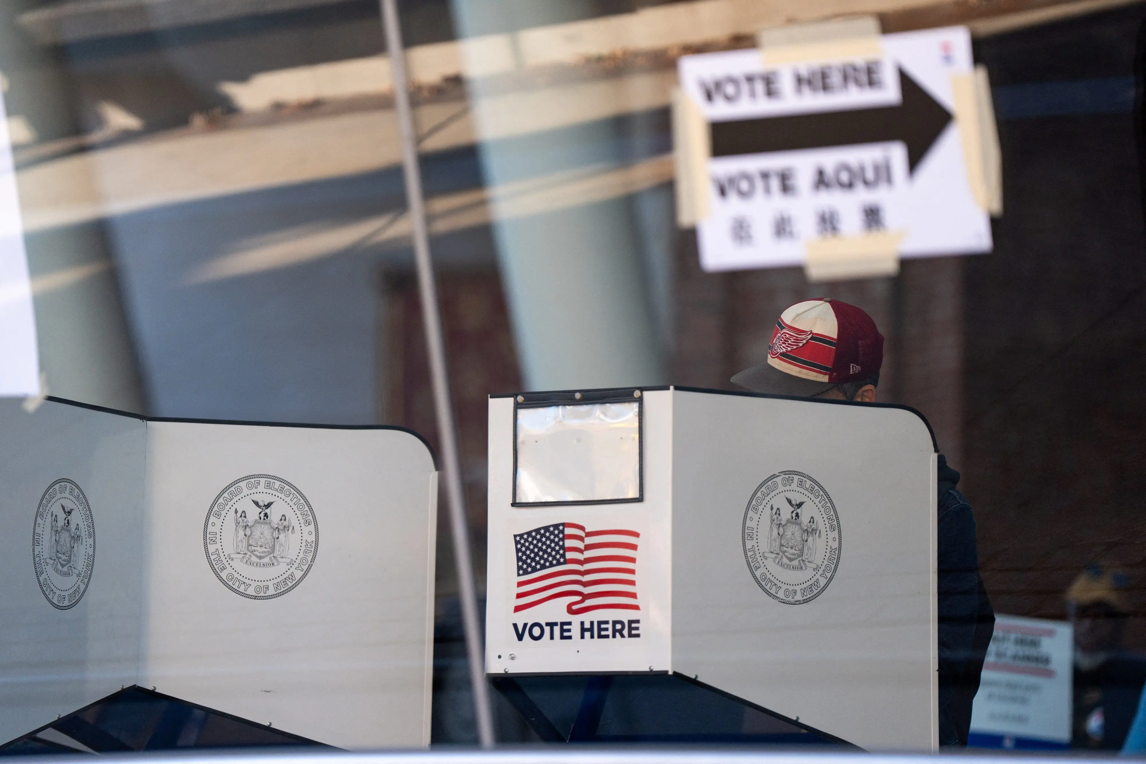 voters-cast-their-ballot-at-a-polling-station-during-early-voting-in-new-york-city-2
