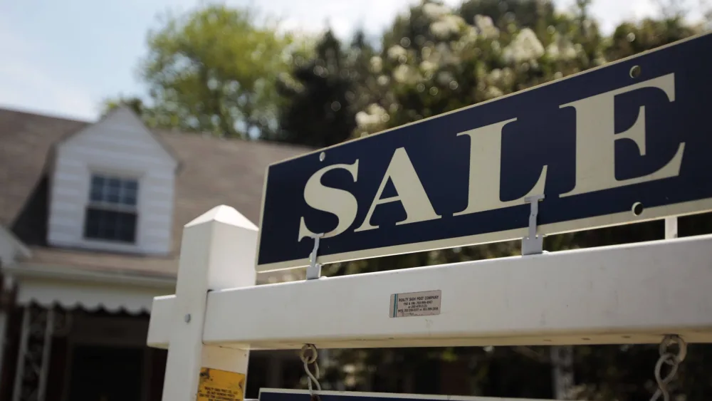 a-sale-sign-advertises-a-home-in-alexandria-virginia
