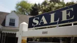 a-sale-sign-advertises-a-home-in-alexandria-virginia