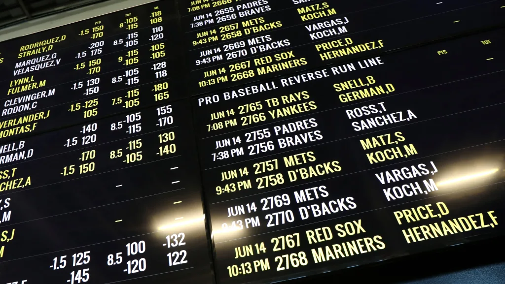 baseball-betting-odds-are-displayed-at-monmouth-park-sports-book-by-william-hill-on-the-opening-of-the-first-day-of-legal-betting-on-sports-in-oceanport