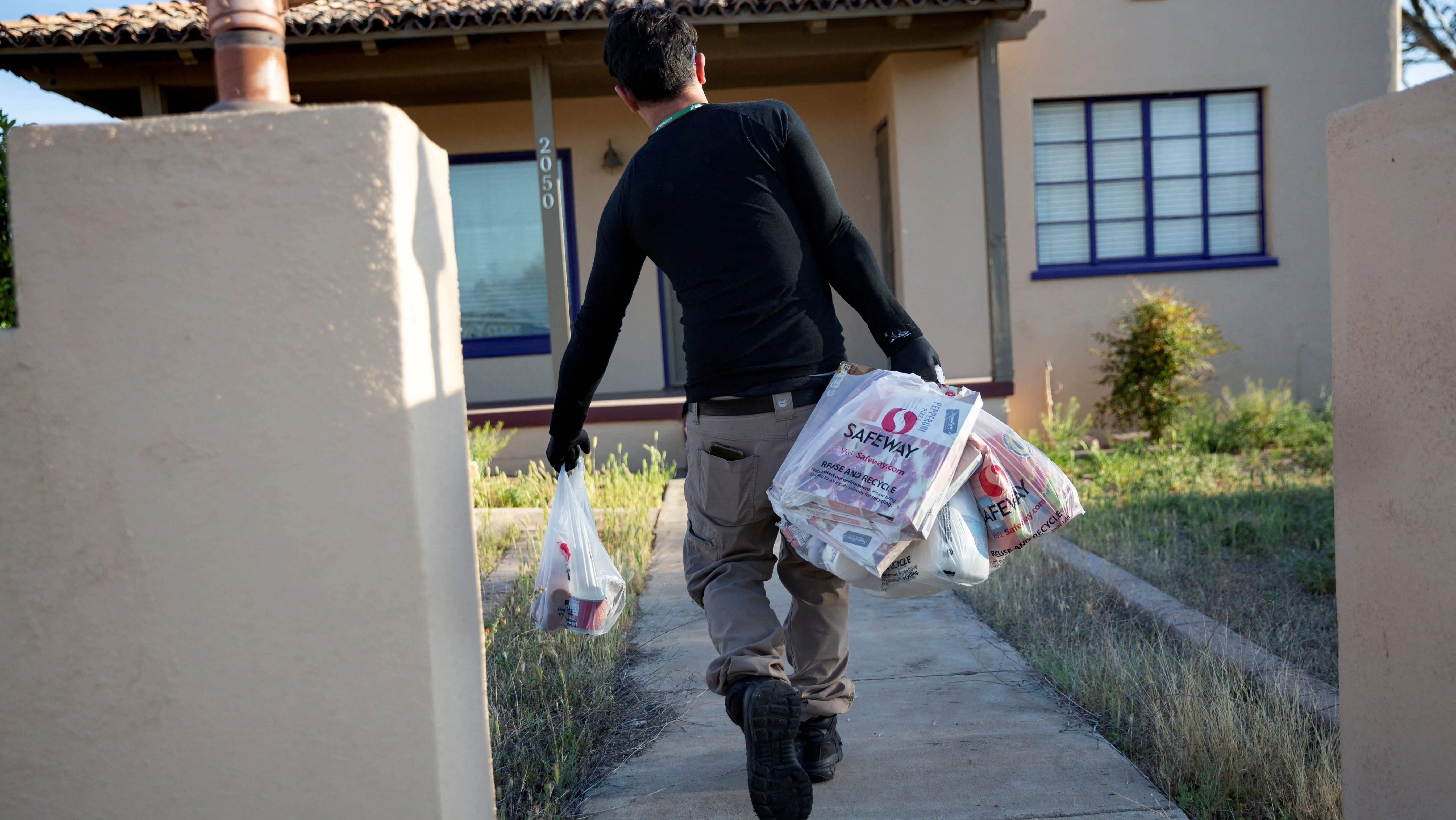 file-photo-instacart-employee-eric-cohn-works-amid-the-coronavirus-outbreak