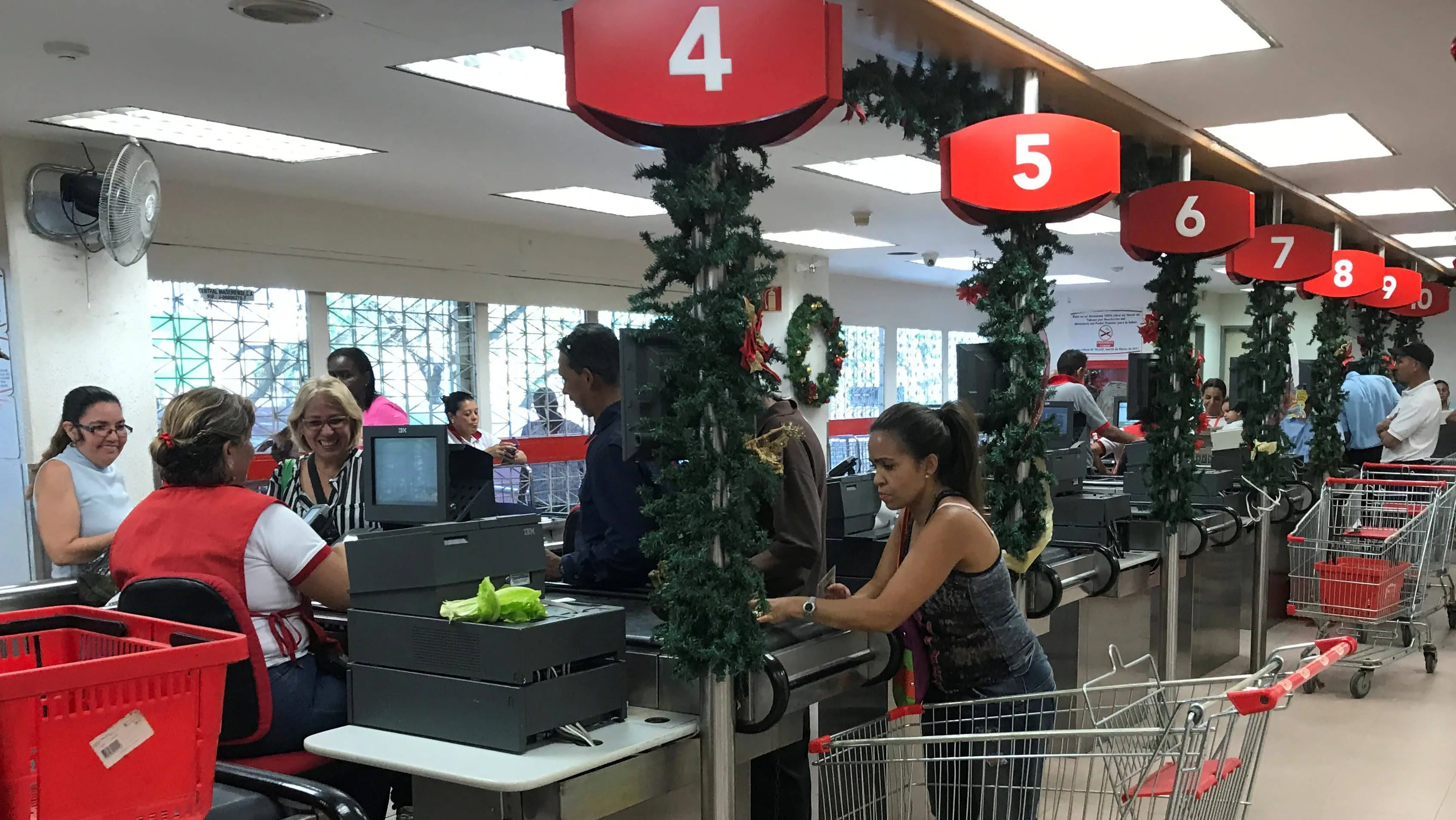 people-line-up-at-checkout-counters-in-a-supermarket-in-caracas