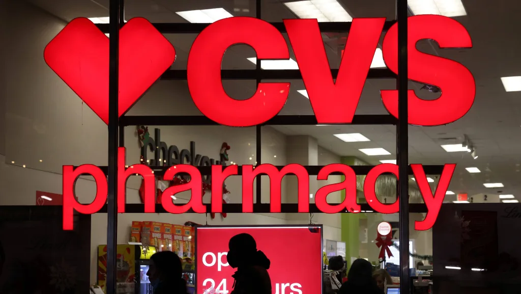 people-walk-by-a-cvs-pharmacy-store-in-manhattan-new-york-city