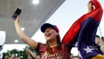 people-wave-venezuelan-flags-and-react-to-the-news-of-u-s-strikes-on-venezuela-and-capture-of-president-maduro-in-miami