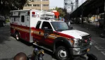 an-ambulance-carrying-the-body-of-fahy-drives-away-from-the-newyork-presbyterian-allen-hospital-past-members-of-the-media-in-new-york