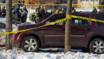 police-tape-surrounds-a-vehicle-after-its-driver-was-shot-by-a-u-s-immigration-agent-according-to-local-and-federal-officials-in-minneapolis