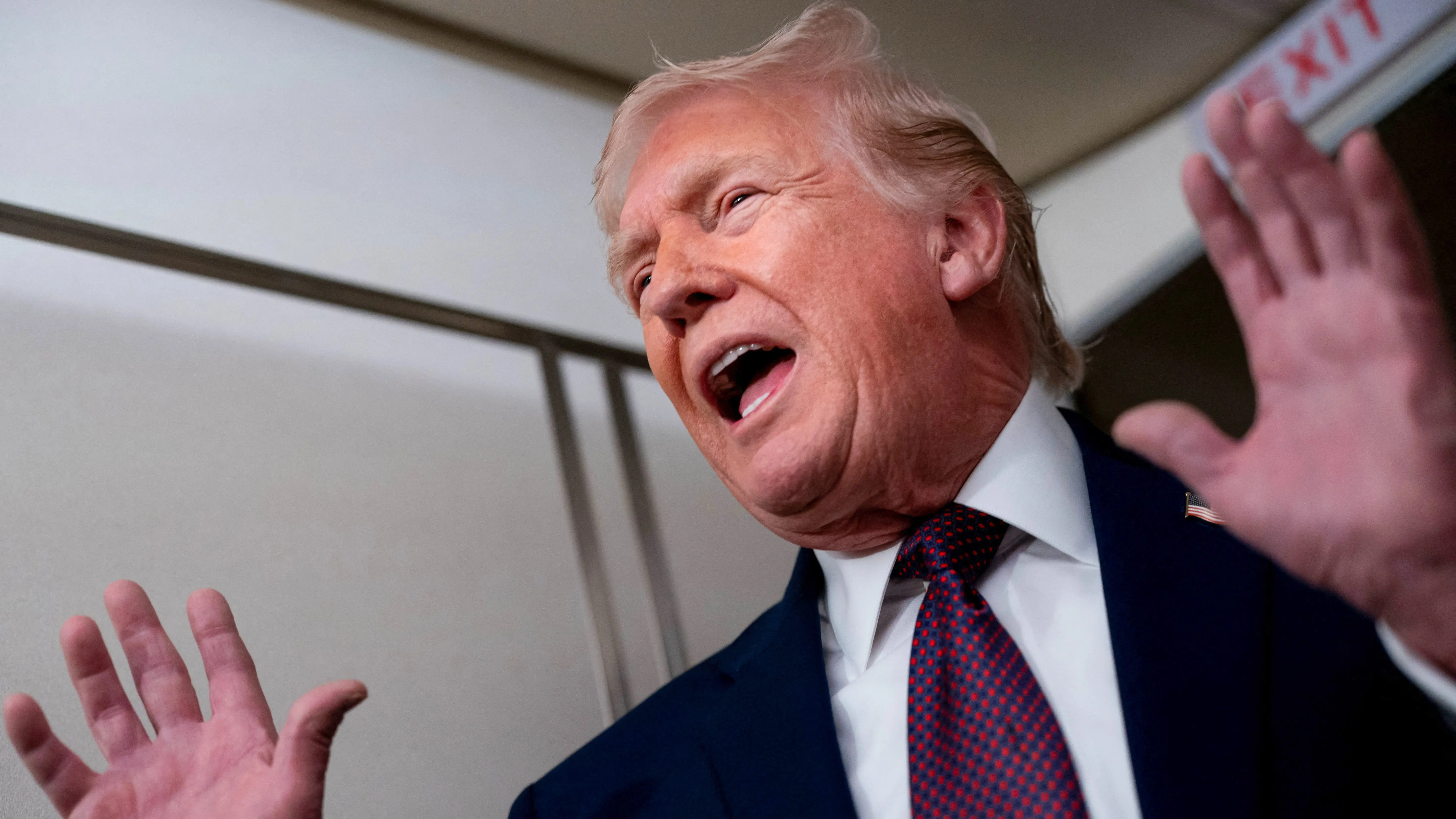 u-s-president-donald-trump-speaks-with-members-of-the-media-aboard-air-force-one-en-route-to-joint-base-andrews
