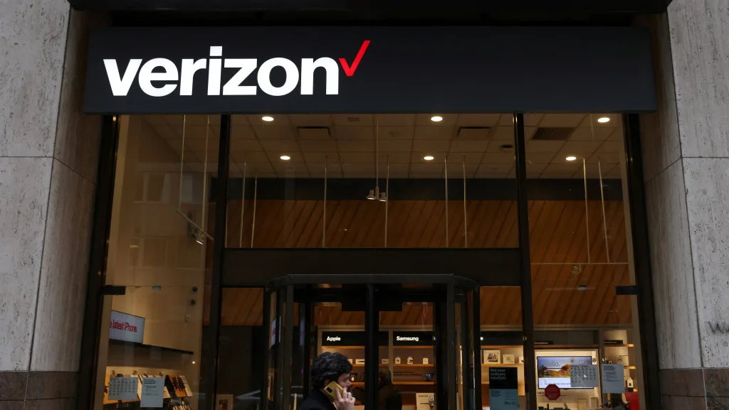 file-photo-a-person-walks-by-a-verizon-store-in-manhattan-new-york-city
