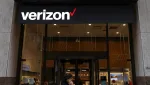 file-photo-a-person-walks-by-a-verizon-store-in-manhattan-new-york-city