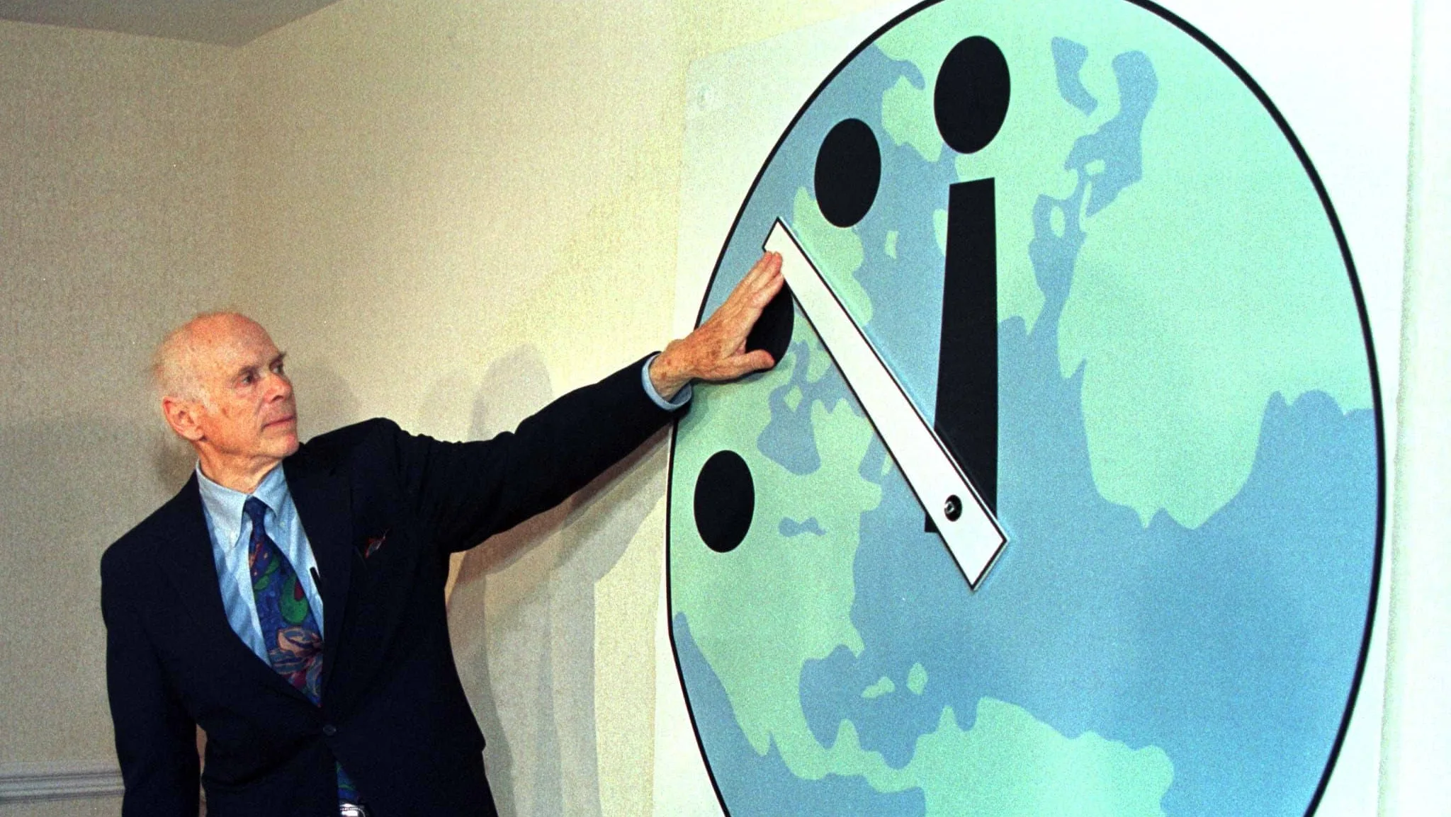 leonard-rieser-adjusts-the-doomsday-clock