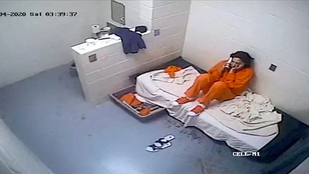 ghislaine-maxwell-uses-a-phone-in-her-cell-in-brooklyns-metropolitan-detention-center-in-july-2020