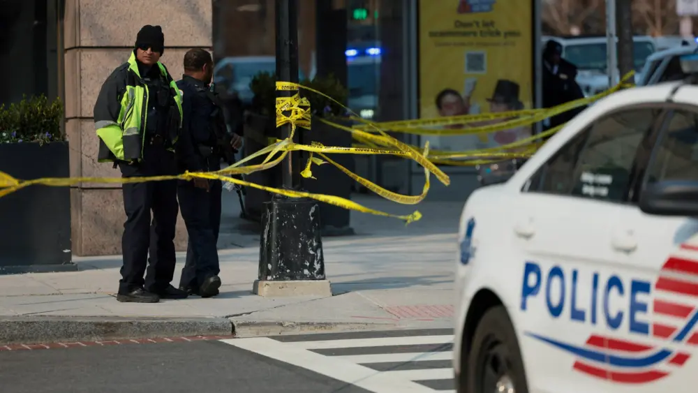 a-police-officer-stands-guard-on-the-scene-of-a-bomb-threat-investigation-in-washington