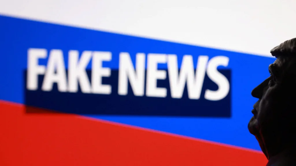 illustration-shows-3d-printed-miniature-of-u-s-president-donald-trump-russian-flag-and-words-fake-news